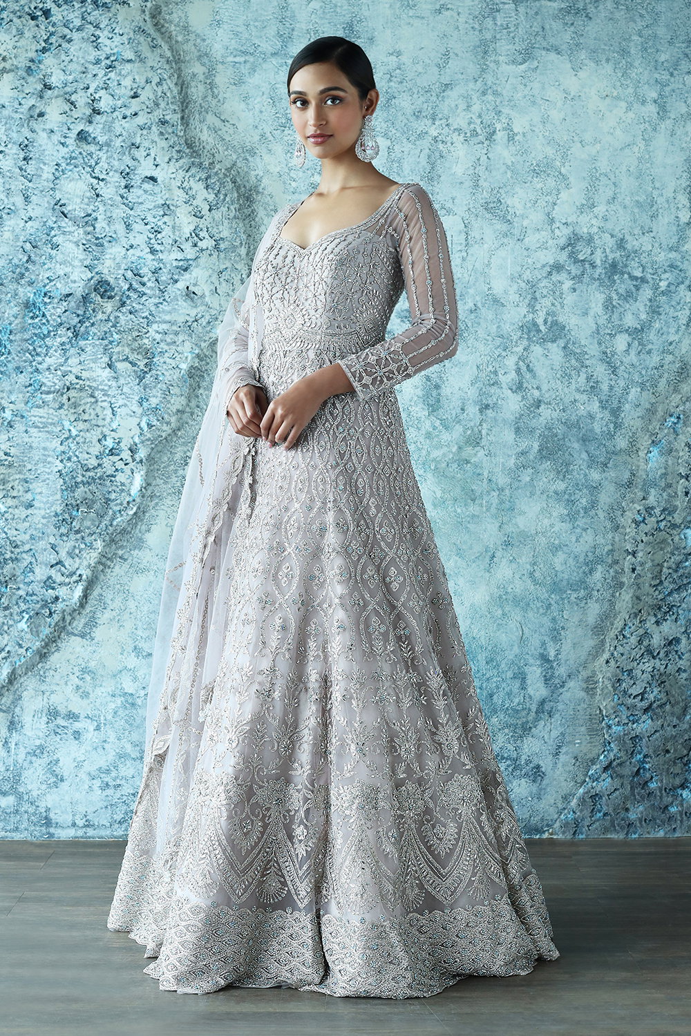DUSTY LAVENDER GOWN SET WITH ALL OVER PATTERNED SILVER ZARI EMBROIDERY  PAIRED WITH A MATCHING EMBROIDERED DUPATTA AND ALL OVER SILVER HIGHLIGHTS.  - Seasons India