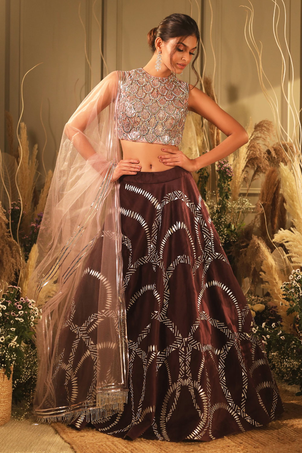 BROWN WINE CUTWORK EMBROIDERED LEHENGA WITH A CONTRAST BISCUIT COLOURED  EMBROIDERED BLOUSE PAIRED WITH A MATCHING DUPATTA AND TASSELS. - Seasons  India